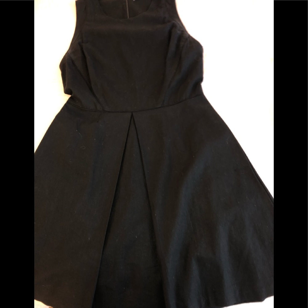 Black linen flared dress with cut in sleeveless